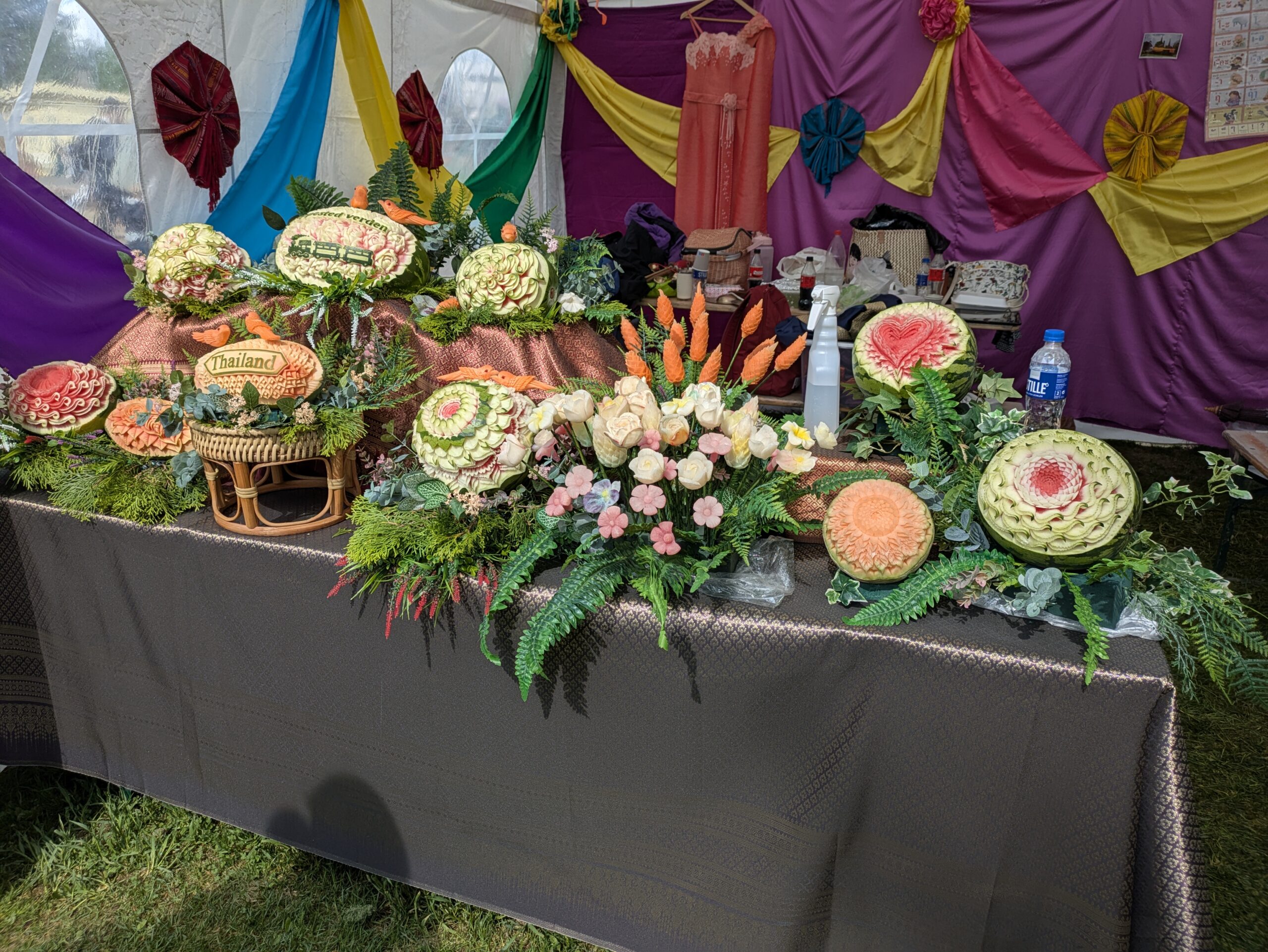 Amazing fruit carvings displayed on a table